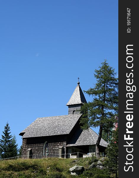 Wooden church in memory of the martyrs of World War to crossing between Austria and Italy in Passo Pramollo - Pontebba - Udine - Friuli - Italy.