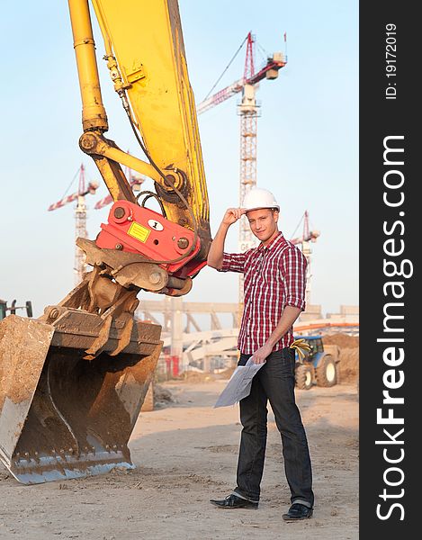 Architect Working Outdoors On A Construction Site