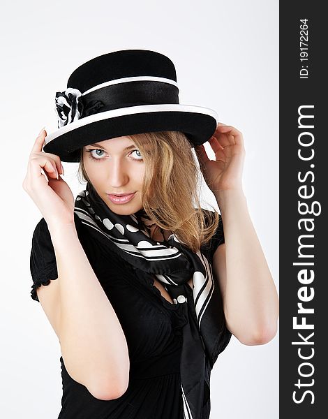 Elegant Woman Is In A Black Hat.