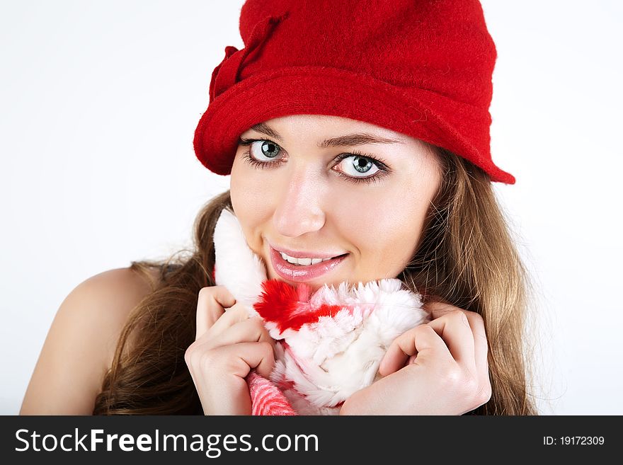 Beautiful woman in winter red hat.