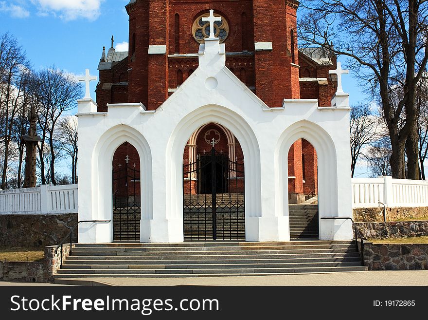 Entrance Gate To The Catholic Church In Arch