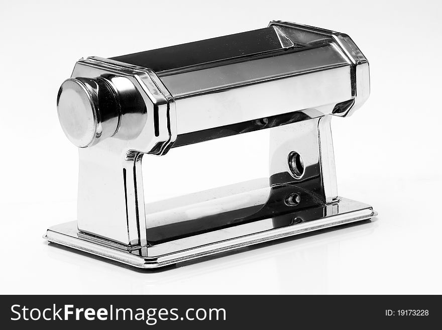 Pasta machine in black and white over a lightly graduated backdrop