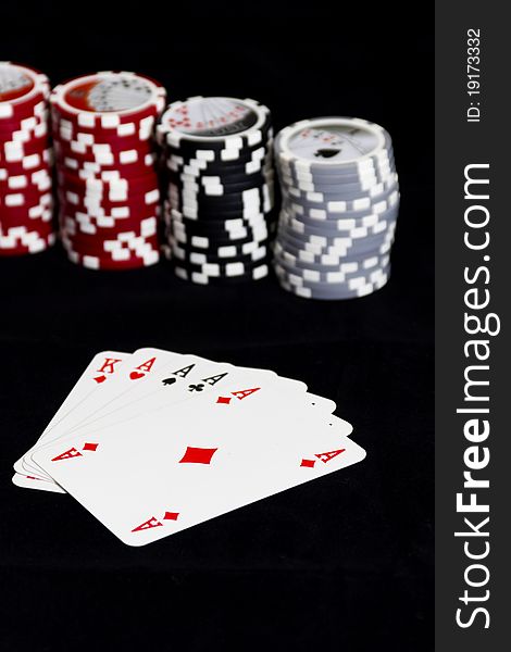 Poker of aces, and chips of a cards game set. Poker of aces, and chips of a cards game set.