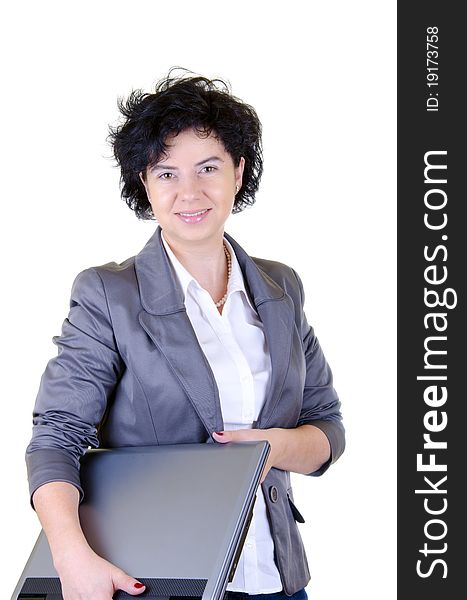 Smiling businesswoman in gray jacket with laptop. Smiling businesswoman in gray jacket with laptop