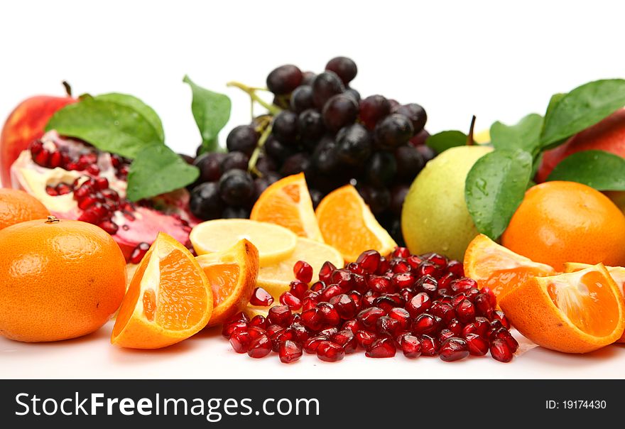 Ripe fruit on a white background