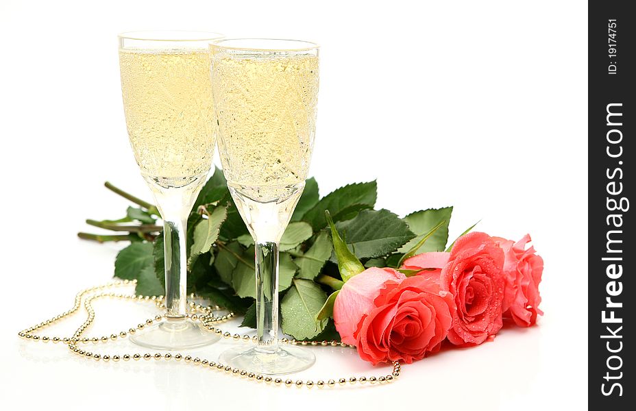 Champagne and roses on a white background