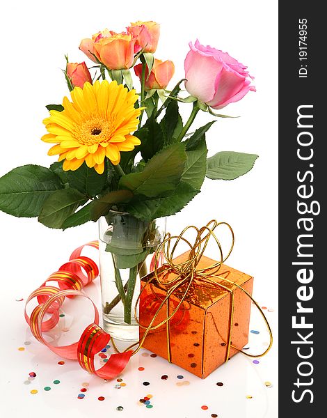 Bouquet with roses and a gift on a white background