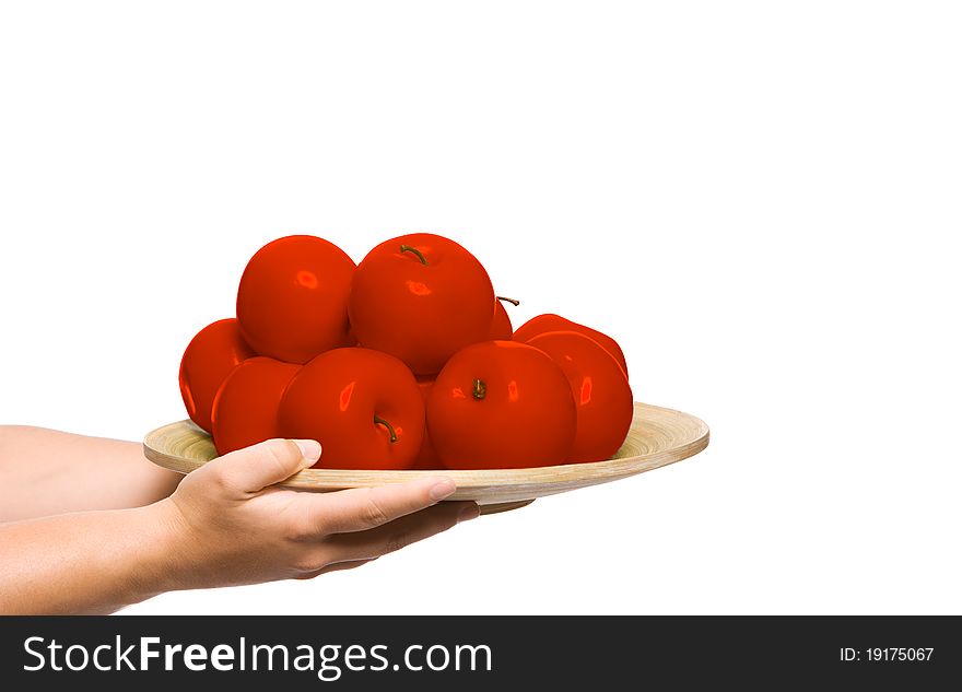 Somebody holding a plate of fresh red apples