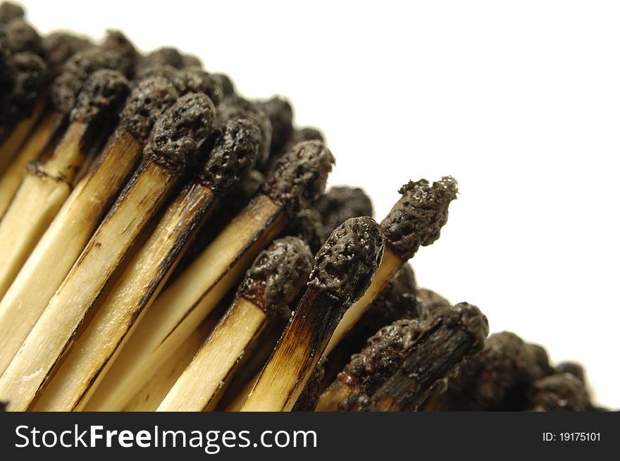 Used matches behind white background. Used matches behind white background