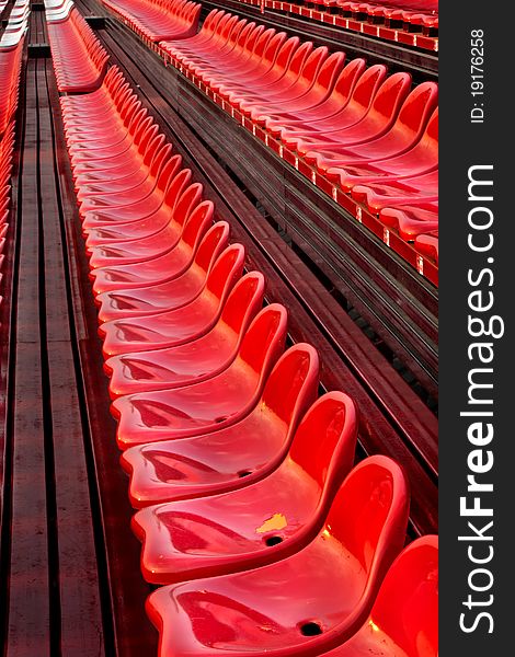 Red seats in football stadium