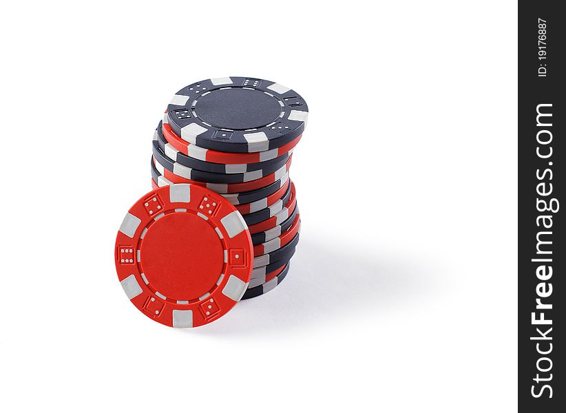 Red and black casino tokens, isolated on white background