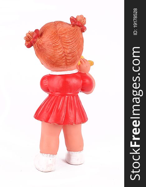 Rear rubber doll with red dress isolated on white background