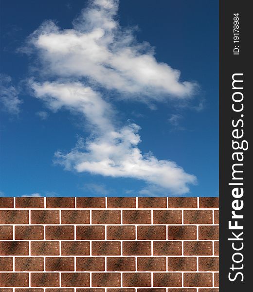 A  cloudy blue sky over a brick wall