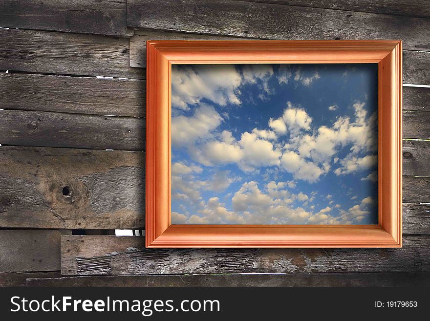 Blue sky in wood picture frame