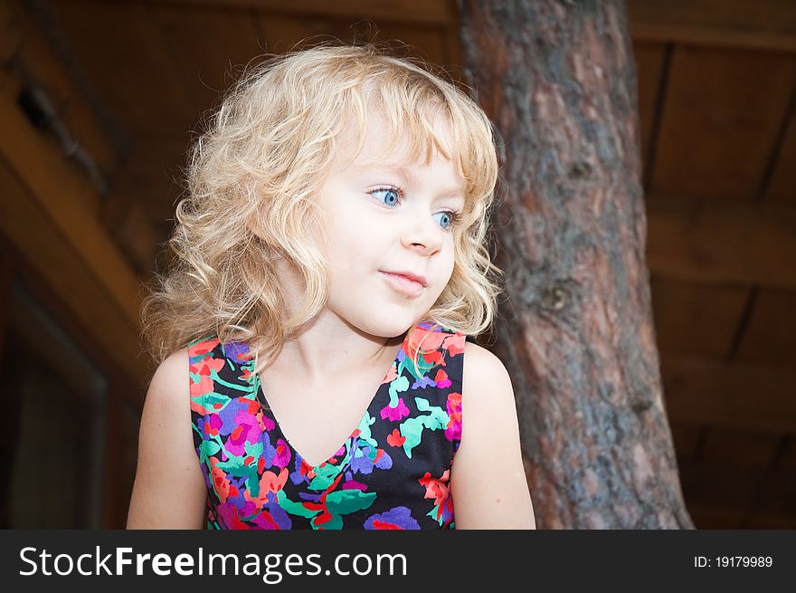 Adorable girl on the nature camping