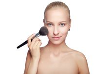 Beautiful Blond Woman Applying Blusher Royalty Free Stock Images Beautiful Blond Woman Applying Blusher Royalty Free Stock Images