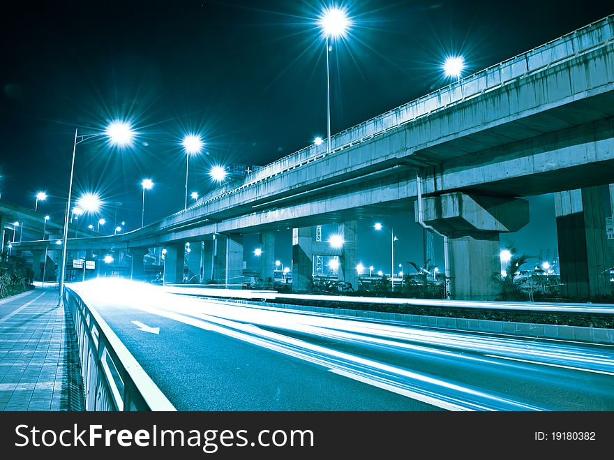 Modern city night, roads with heavy traffic