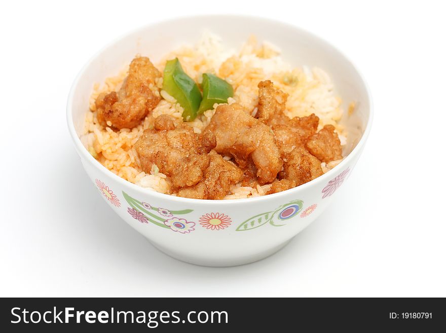 Close up of sweet and sour pork rice isolated on white background.