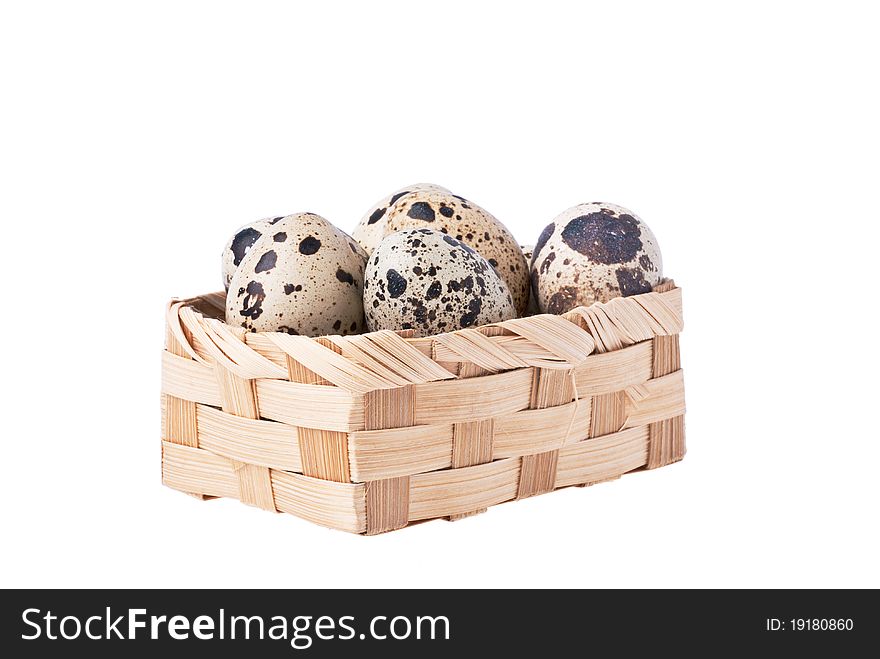 A basket with egg, isolated on white