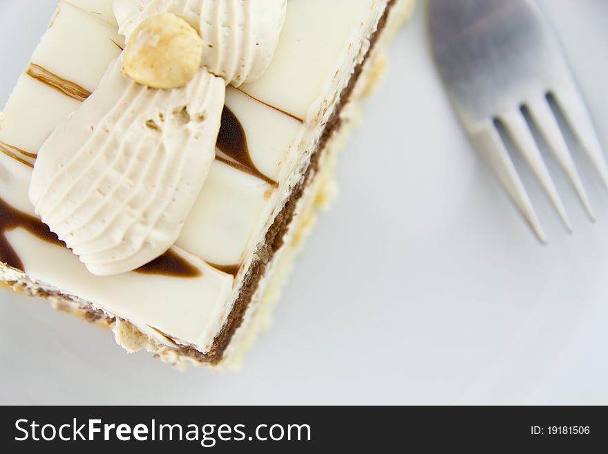Nougat cake with fork , image from above. Nougat cake with fork , image from above