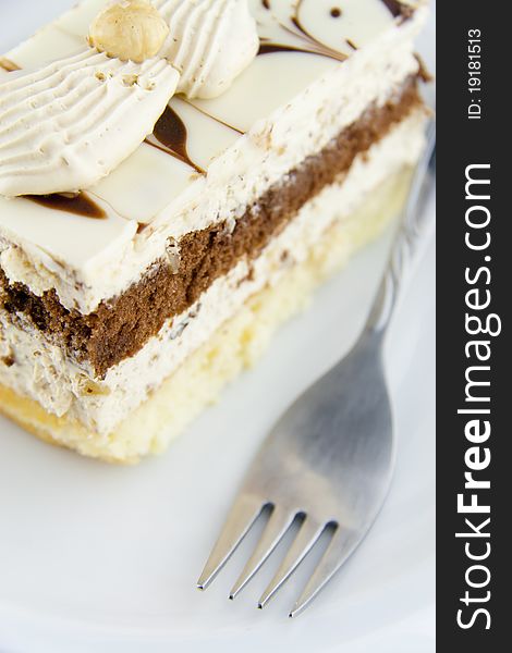 Nougat cake with fork , image from above. Nougat cake with fork , image from above