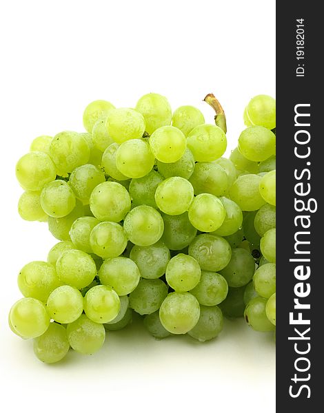 Green grapes on white background