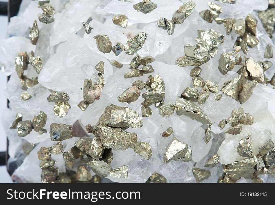 Grain mineral quartz and pyrite in the manner of background. Grain mineral quartz and pyrite in the manner of background