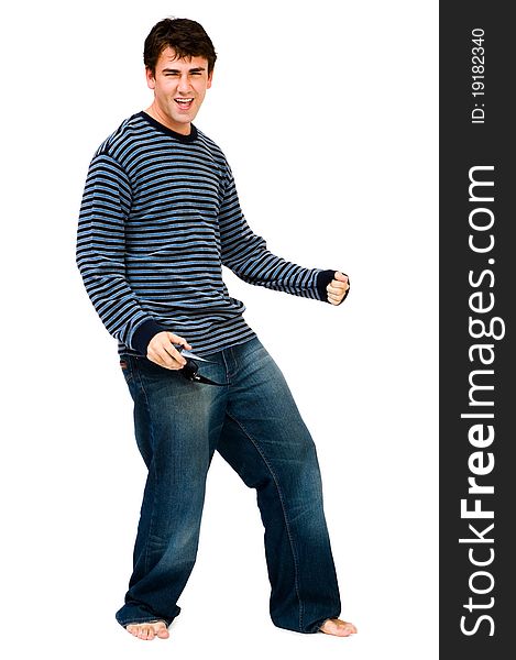 Happy young man dancing and posing isolated over white. Happy young man dancing and posing isolated over white