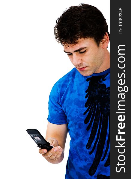 Handsome man text messaging on a mobile phone isolated over white