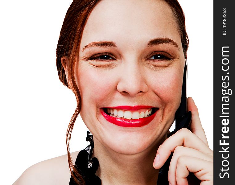 Caucasian woman talking on a mobile phone isolated over white. Caucasian woman talking on a mobile phone isolated over white