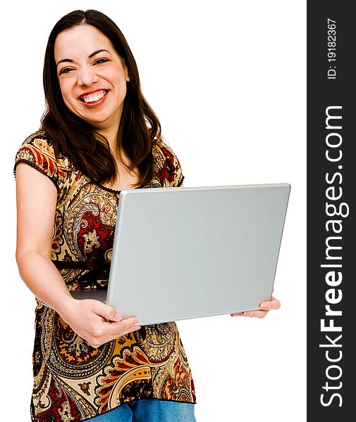 Woman using a laptop and smiling isolated over white