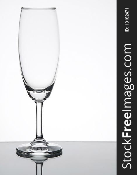 Empty champagne glass as white isoalte background