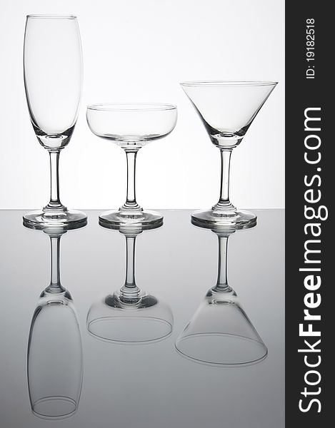 Empty glass with reflection as white isolate background