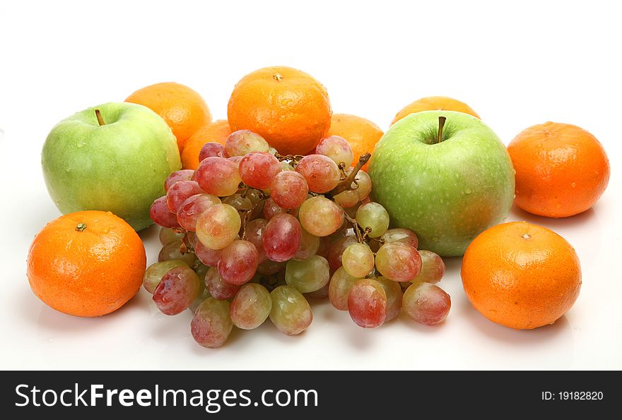 Ripe fruit on a white background