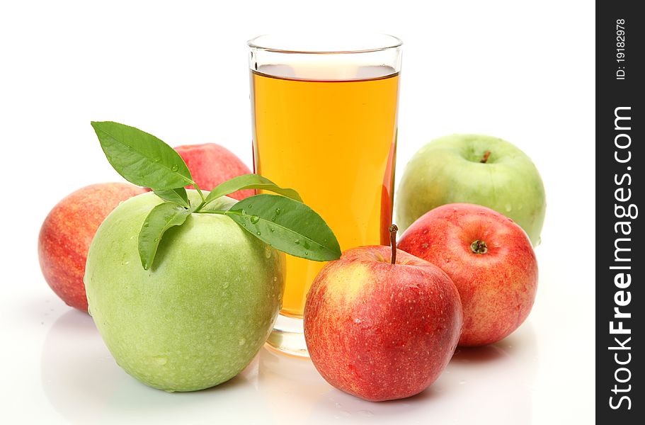 Ripe fruit and juice on a white background