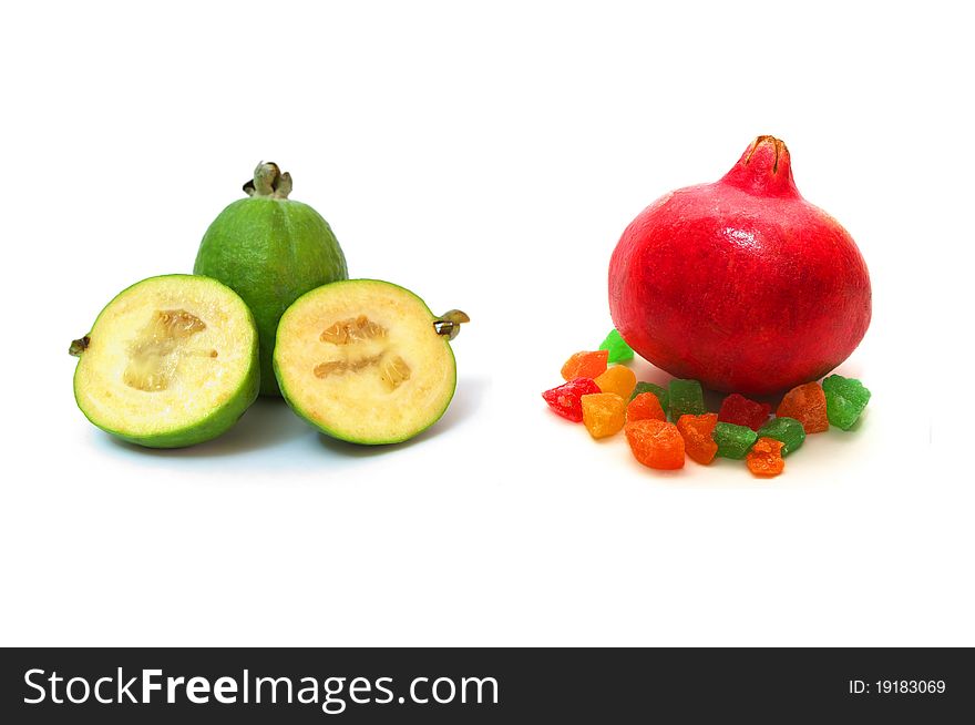 Photo of the Pineapple guava and pomegranate on white background