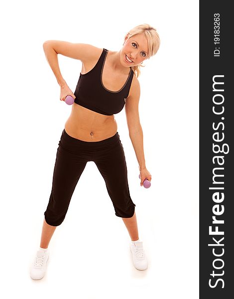 A young female performing stretching exercise on white background