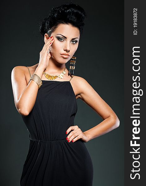 Elegant fashionable woman in black dress