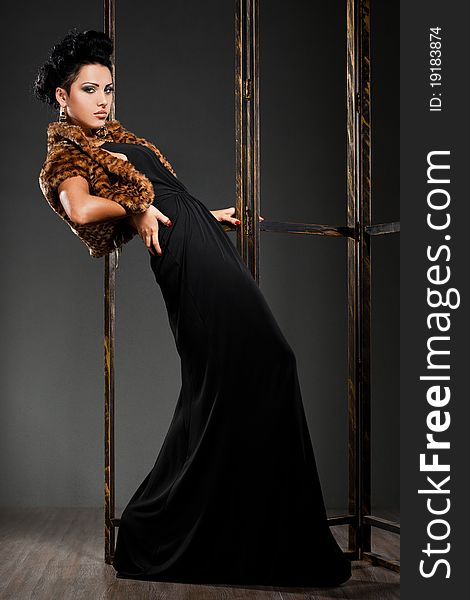 Elegant fashionable woman in black dress