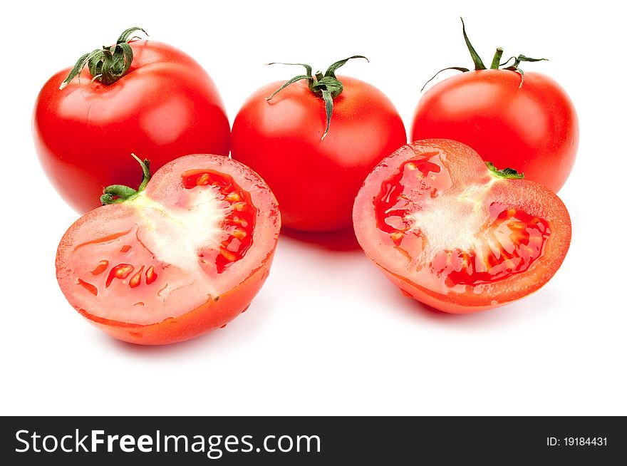 Red fresh ripened tomatoes isolated on a white background