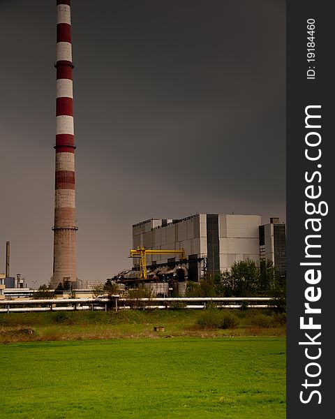 Thermal power station at cloudy day