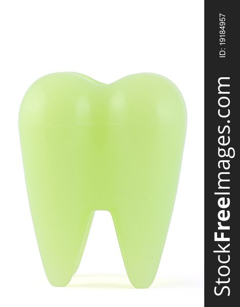 Artificial human tooth in white background