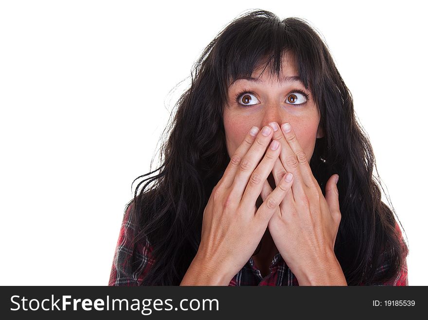 Pretty young woman covering her mouth in surprise. Pretty young woman covering her mouth in surprise.