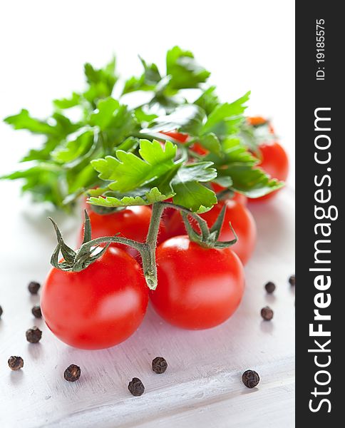 Fresh vine tomatoes with parsley and pepper