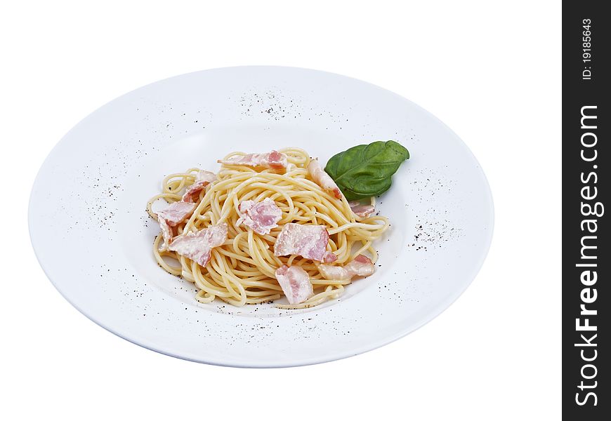 Photo of a spaghetti with creamy sauce and vegetables. Photo of a spaghetti with creamy sauce and vegetables