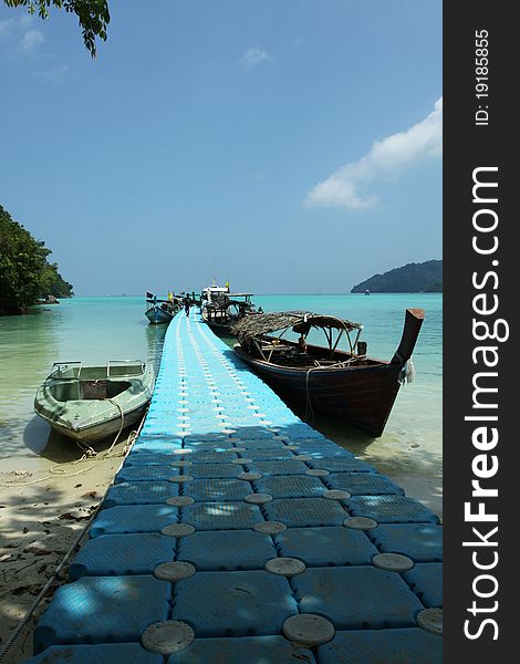 A long boat jetty at the Andaman sea.