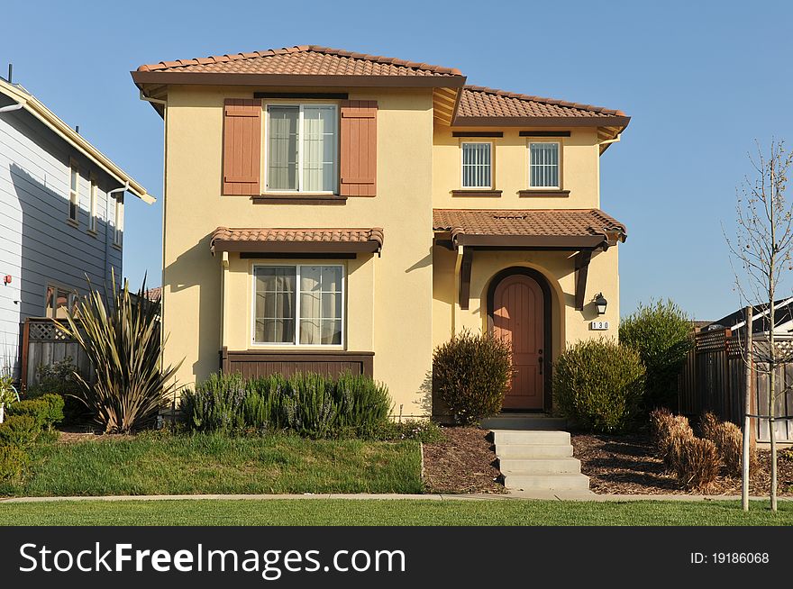 House Surrounded By Trees And Grass