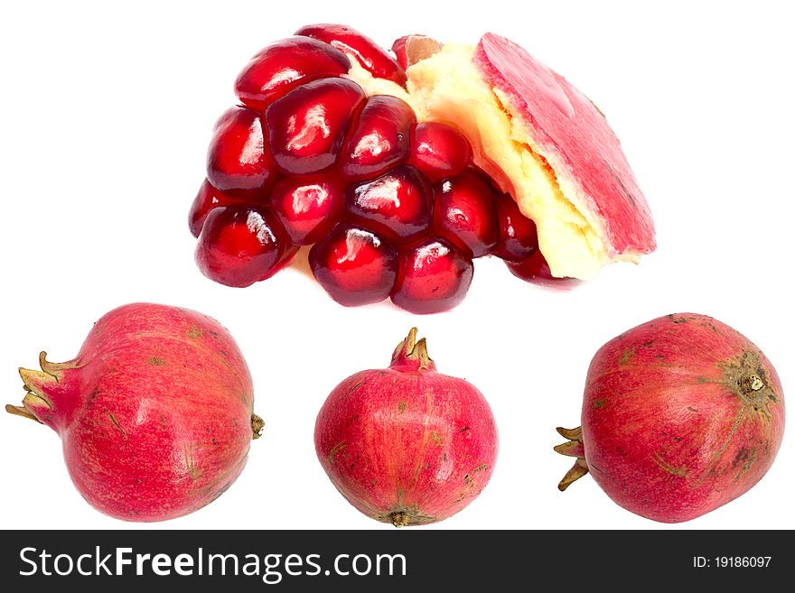 Extreme close up background of a red juicy ripe pomegranate fruit seeds