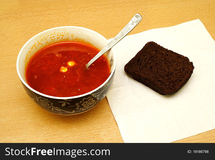 An Overhead View Tomator Soup With Bread