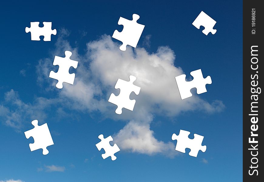 A morning shot of a cloudy blue sky with jigsaw pieces